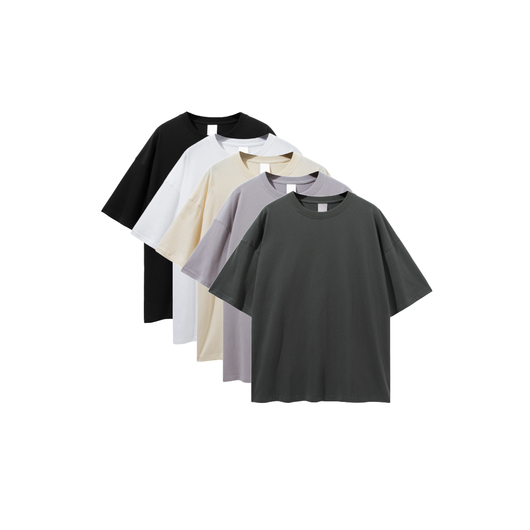 A collection of oversized deep drop shoulder t-shirts in black, white, beige, gray, and dark gray colors.